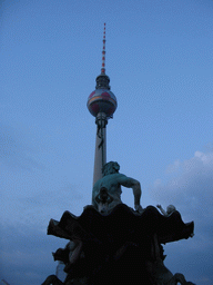 The Neptunbrunnen fountain and the Fernsehturm tower, at sunset