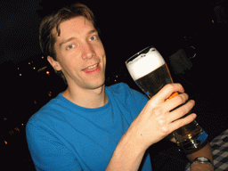 Tim with a beer at a restaurant at the Hackescher Markt square