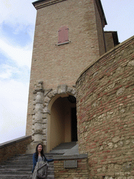 Miaomiao`s friend in front of the main gate of the La Rocca castle