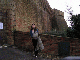 Miaomiao`s friend in front of the gate at the outer square of the La Rocca castle