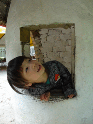 Max in a mushroom house at the playground at BestZoo