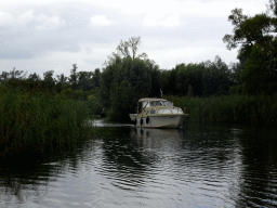 Boat on the Gat van de Buisjes lake, viewed from the Fluistertocht tour boat