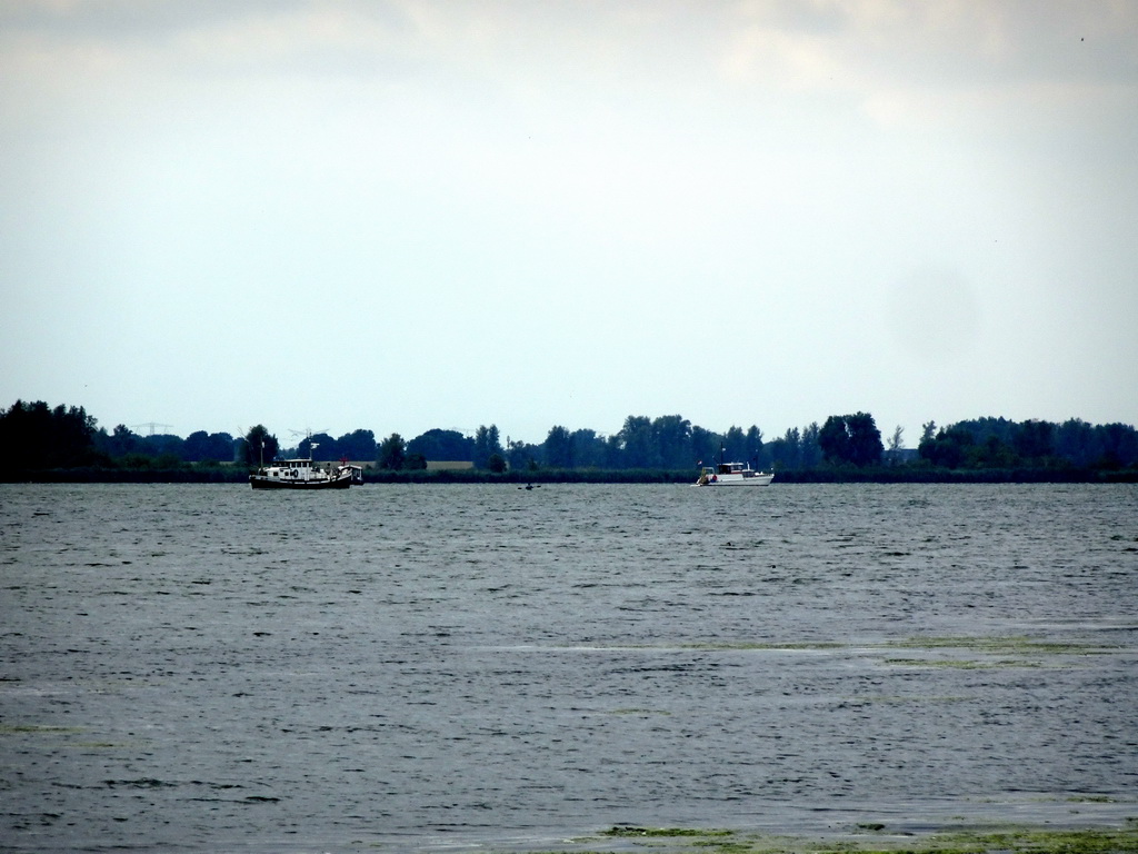 Boats on the Gat van van Kampen lake, viewed from the Fluistertocht tour boat