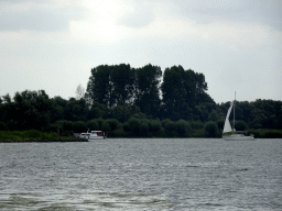 Boats on the Gat van van Kampen lake, viewed from the Fluistertocht tour boat