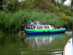 Boat on the Sloot Beneden Petrus creek, viewed from the Fluistertocht tour boat
