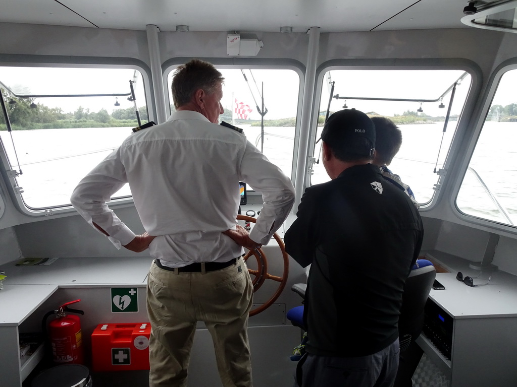 Max, Miaomiao`s father and the tour guide at the Fluistertocht tour boat