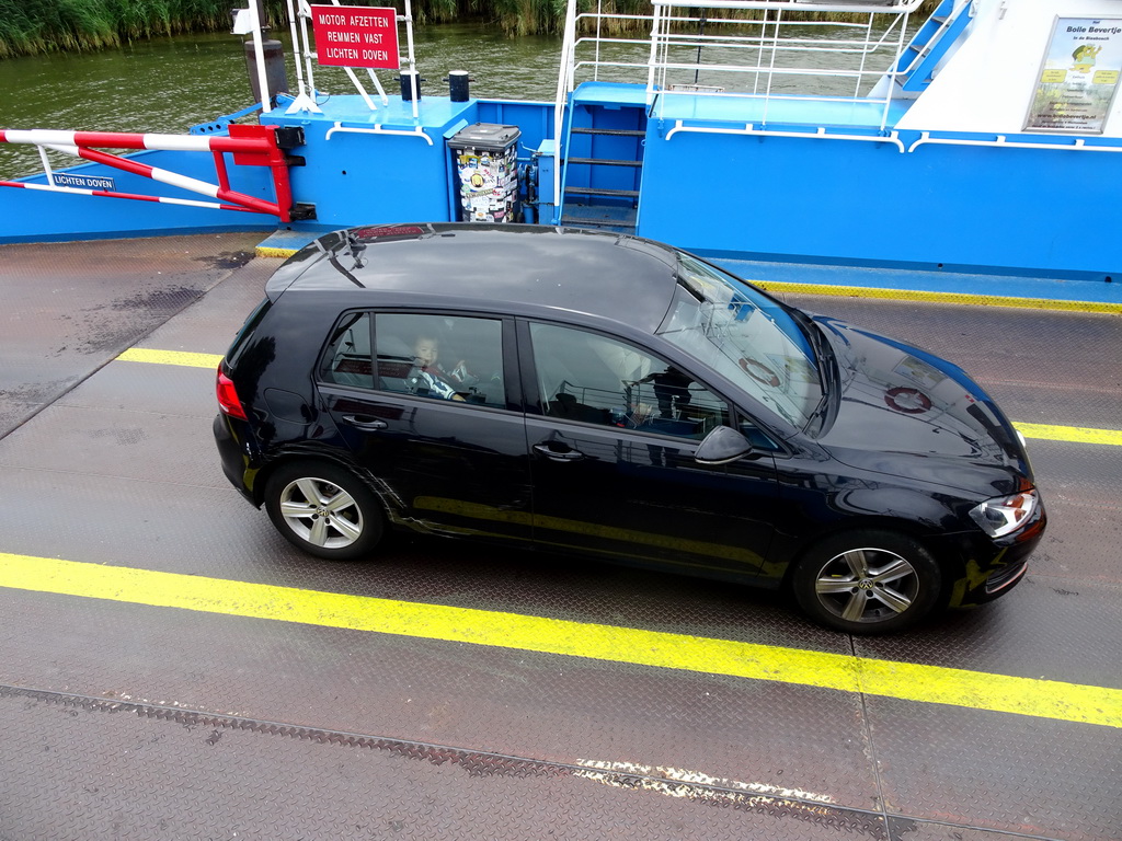 Max in the car on the Biesbosch Ferry over the Nieuwe Merwede canal