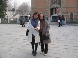 Miaomiao and her friend in front of the Porta Galliera gate at the Piazza XX Settembre square
