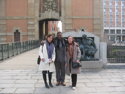 Miaomiao and her friends in front of the Porta Galliera gate at the Piazza XX Settembre square