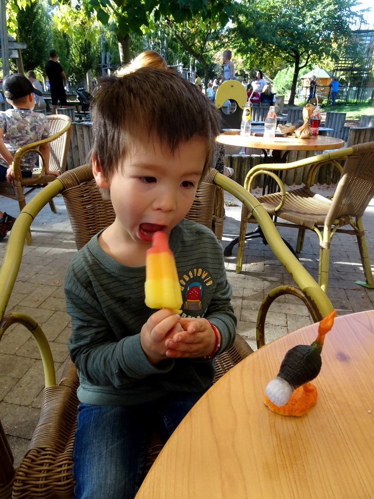 Max having an ice cream at the terrace of the Horeca `t Uulke restaurant at the Kasteelpark Born zoo