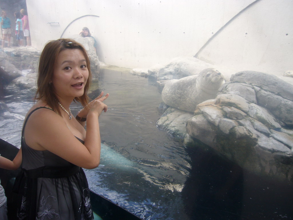 Miaomiao with a seal, at the New England Aquarium