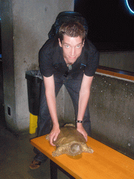 Tim with a turtle model, in the New England Aquarium