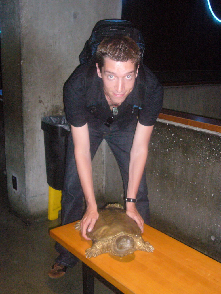 Tim with a turtle model, in the New England Aquarium
