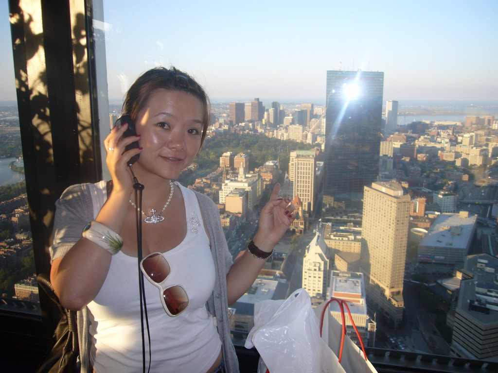 Miaomiao and a view from the Prudential Tower on the John Hancock Tower and the city center