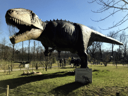 Statue of a Giganotosaurus in the Garden of the Oertijdmuseum, with explanation