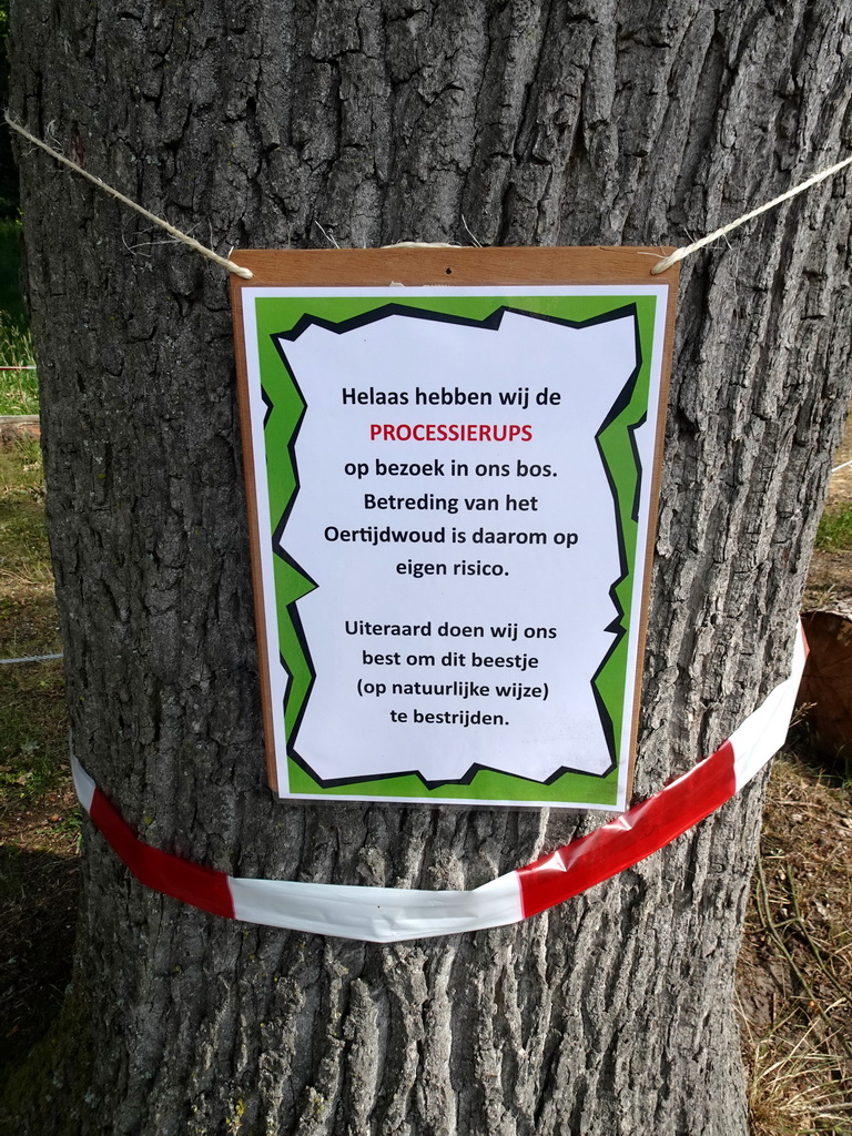 Sign warning for the Oak Processionary Caterpillar at the entrance to the Oertijdwoud forest of the Oertijdmuseum