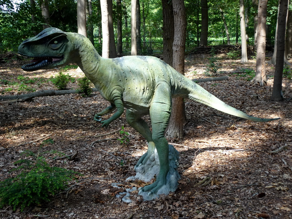 Statue of an Allosaurus at the Oertijdwoud forest of the Oertijdmuseum