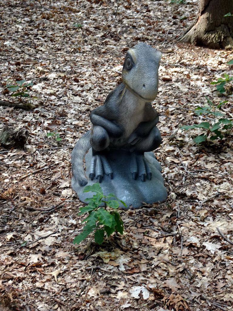 Statue of an Albertonykus in the Oertijdwoud forest of the Oertijdmuseum