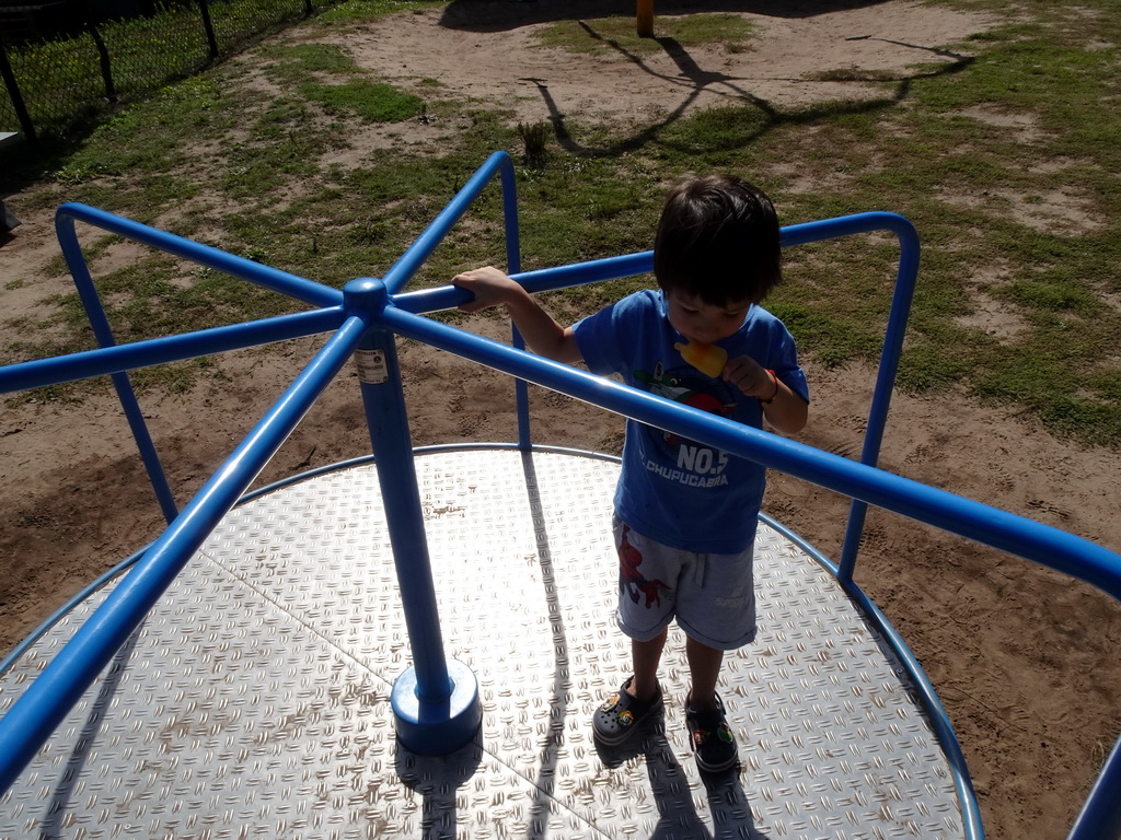 Max with an ice cream at the playground in the Garden of the Oertijdmuseum