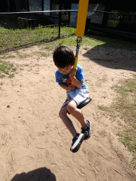 Max at the playground in the Garden of the Oertijdmuseum