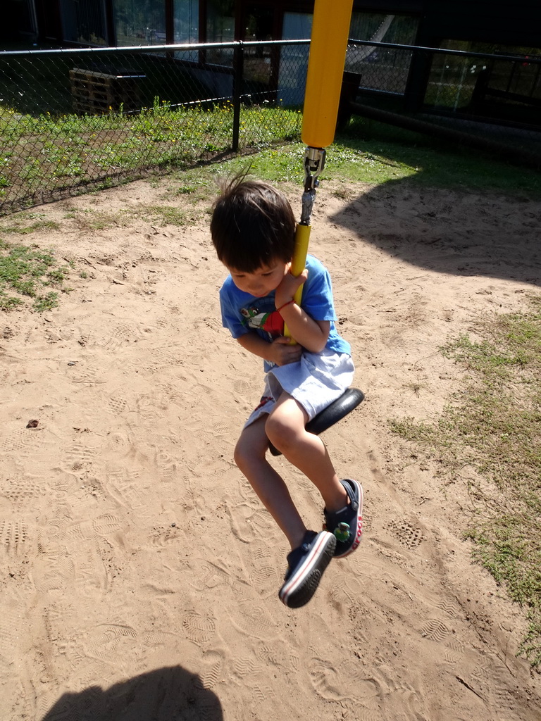 Max at the playground in the Garden of the Oertijdmuseum