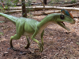 Statue of a Guanlong in the Oertijdwoud forest of the Oertijdmuseum