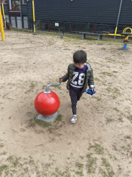 Max at the playground in the Garden of the Oertijdmuseum