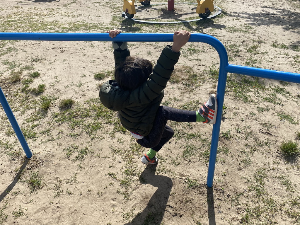 Max at the playground in the Garden of the Oertijdmuseum