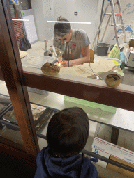 Max and a paleontologist working at the paleontological laboratory at the Upper Floor of the Museum Building of the Oertijdmuseum