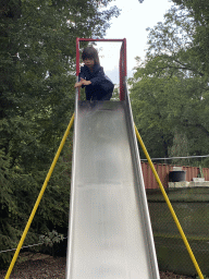 Max on a slide at the playground in the Oertijdwoud forest of the Oertijdmuseum