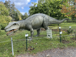 Postosuchus statue at the Garden of the Oertijdmuseum, with explanation