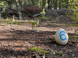 Comsognathus statues in the Oertijdwoud forest of the Oertijdmuseum