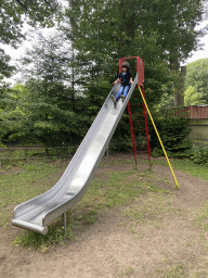 Max on the slide at the playground in the Oertijdwoud forest of the Oertijdmuseum