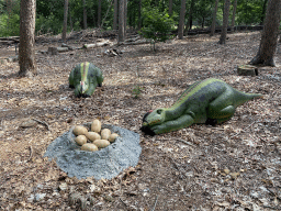 Statues of Muttaburrasauruses and eggs in the Oertijdwoud forest of the Oertijdmuseum