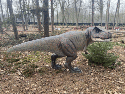 Statue of a Tarbosaurus in the Oertijdwoud forest of the Oertijdmuseum