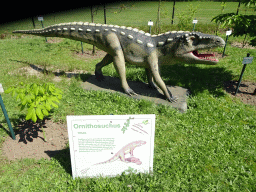 Statue of an Ornithosuchus in the Garden of the Oertijdmuseum, with explanation