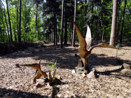 Statues of Pterodactyls in the Oertijdwoud forest of the Oertijdmuseum
