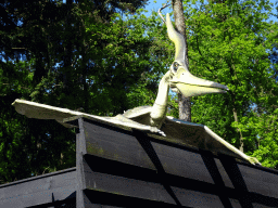 Statue of a Pteranodon on top of the Boshut restaurant in the Oertijdwoud forest of the Oertijdmuseum
