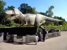 Max and his grandfather with a statue of a Tyrannosaurus Rex at the entrance to the Oertijdmuseum at the Bosscheweg street