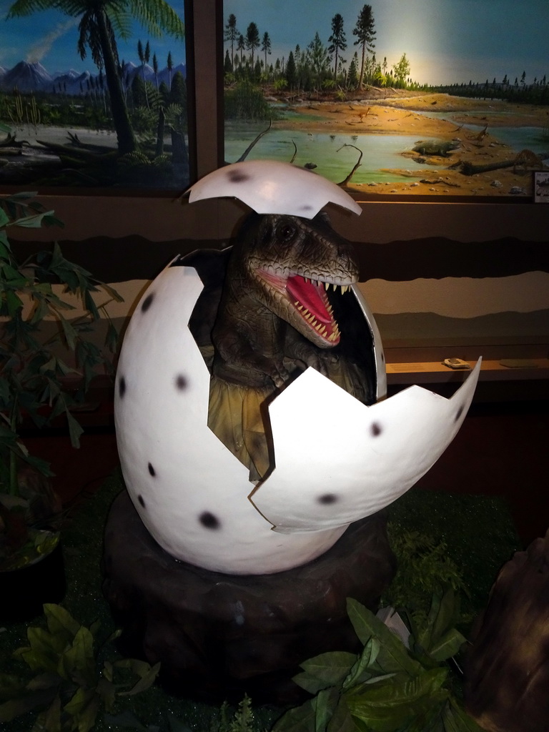 Statue of a dinosaur in an egg at the Lower Floor of the Museum Building of the Oertijdmuseum