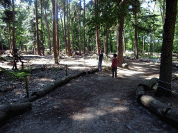 Max`s grandparents with dinosaur statues in the Oertijdwoud forest of the Oertijdmuseum