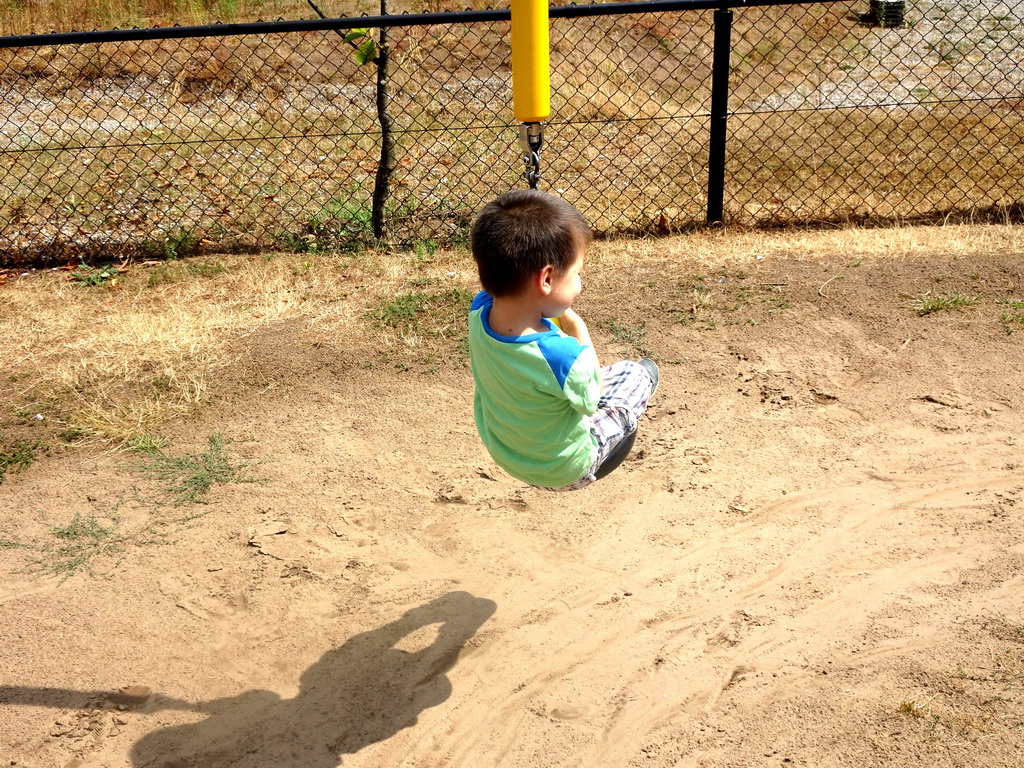 Max at the playground in the Garden of the Oertijdmuseum