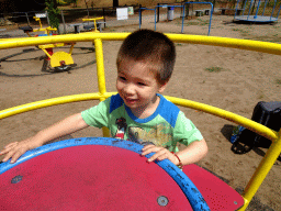 Max at the playground in the Garden of the Oertijdmuseum