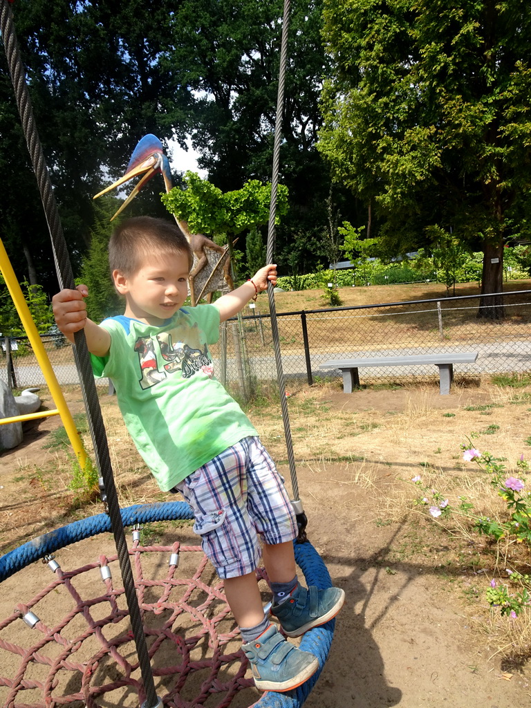 Max at the playground in the Garden of the Oertijdmuseum