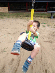 Max at the playground in the Garden of the Oertijdmuseum