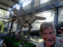 Tim`s father with a skeleton of a Stegosaurus at the Middle Floor of the Dinohal building of the Oertijdmuseum