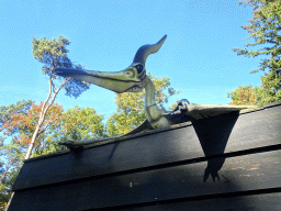 Statue of a Pteranodon on top of the Boshut restaurant in the Oertijdwoud forest of the Oertijdmuseum