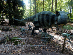 Statues of Tyrannosauruses Rex in the Oertijdwoud forest of the Oertijdmuseum
