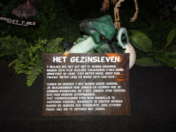 Statue of a Tyrannosaurus Rex coming out of an egg at the Upper Floor of the Museum Building of the Oertijdmuseum, with explanation