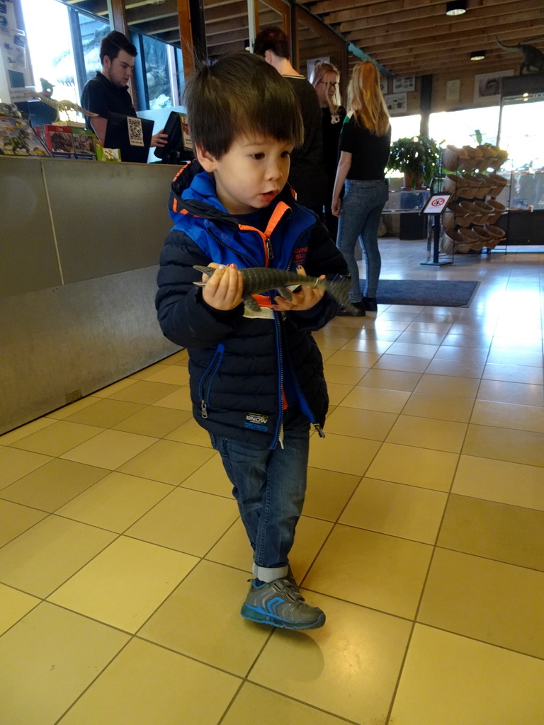 Max with a Mosasaurus toy at the Lower Floor of the Museum Building of the Oertijdmuseum